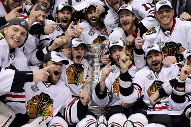 Marian Hossa gives Brent Sopel the ol